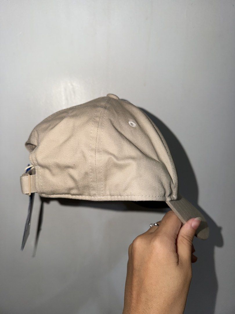 Adidas Cap Beige with Black Logo (Category: Caps & Hats) located in San Pedro. Submitted by b_shoppu (Listing ID 1464176442, Image 2). Description: - Classic Adidas cap - Neutral beige color - Iconic black trefoil logo embroidered on front - Adjustable strap for a comfortable fit - Great for everyday wear - Simple and stylish.
