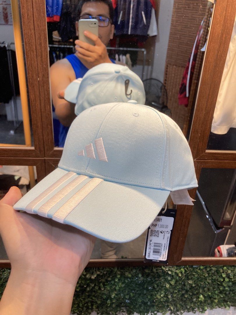 Adidas Cap Light Blue (Category: Caps & Hats) located in Trece Martires City. Submitted by thriftkoto.91 (Listing ID 1464217193, Image 1). Description: - Light blue Adidas cap - Classic three stripes on brim - Adidas logo on front - Adjustable strap at the back - One size fits most - Ideal for everyday wear.