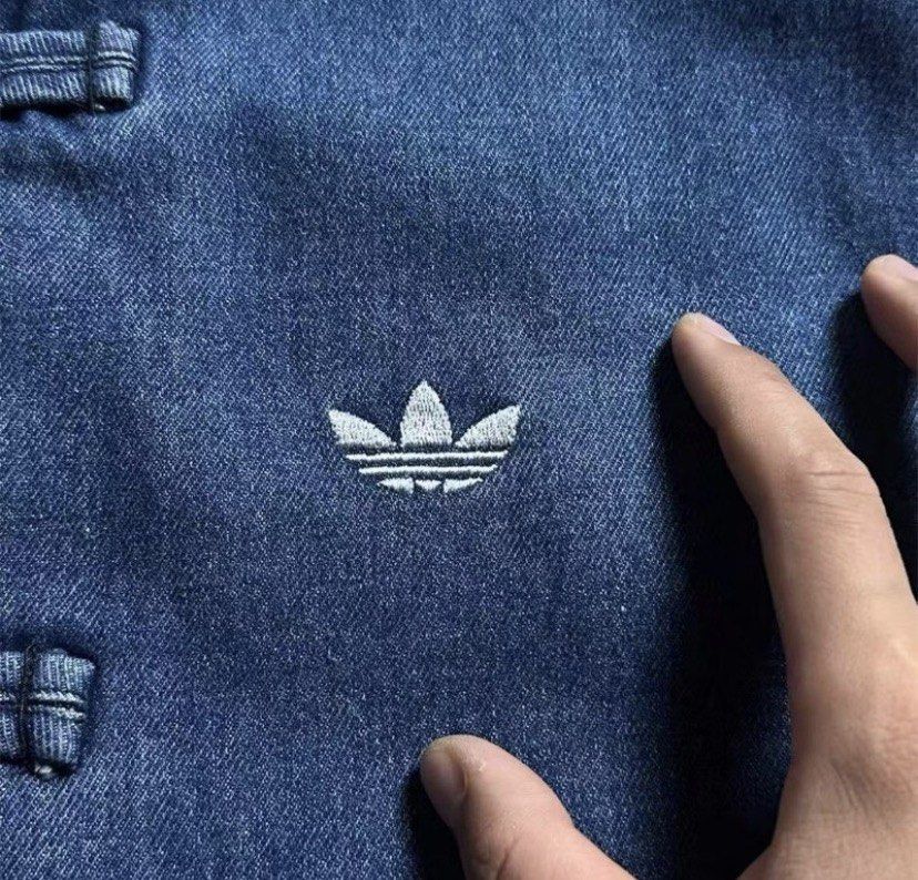 Adidas CNY Denim Track Jacket (Category: Activewear) located in Cordova. Submitted by aux.archive (Listing ID 1464332842, Image 3). Description: large fit also medium newly bought rfs : weather doesn’t fit the jacket😭 no issues excellent condition .