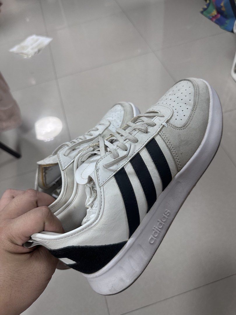 Adidas court80s white cloud (Category: Sneakers) located in Las Pinas. Submitted by treyyywayyy (Listing ID 1464255223, Image 1). Description: FREE ACRYLIC SHOE BOX LOC: LAS PINAS OR DOUBLE DRAGON PASAY - Classic Adidas sneakers in white with black stripes. - Size: US 10.5 - Shows some signs of wear on soles and uppers. - Still has plenty of life left. - Perfect for everyday casual wear..