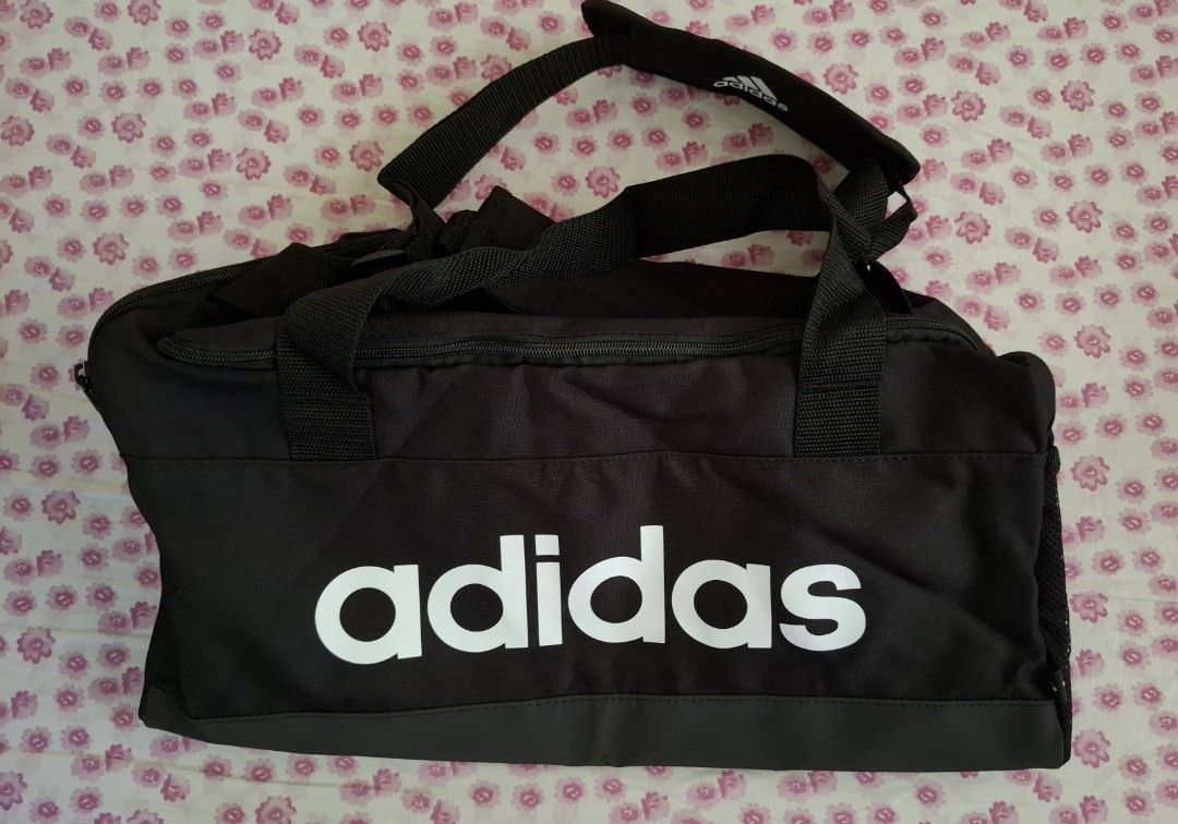 Adidas Duffel Bag (Category: Sling Bags) located in Bulacan. Submitted by conice08 (Listing ID 1464190728, Image 1). Description: Extra Small 15 cm x 37 cm x 20 cm Never used but no tag.