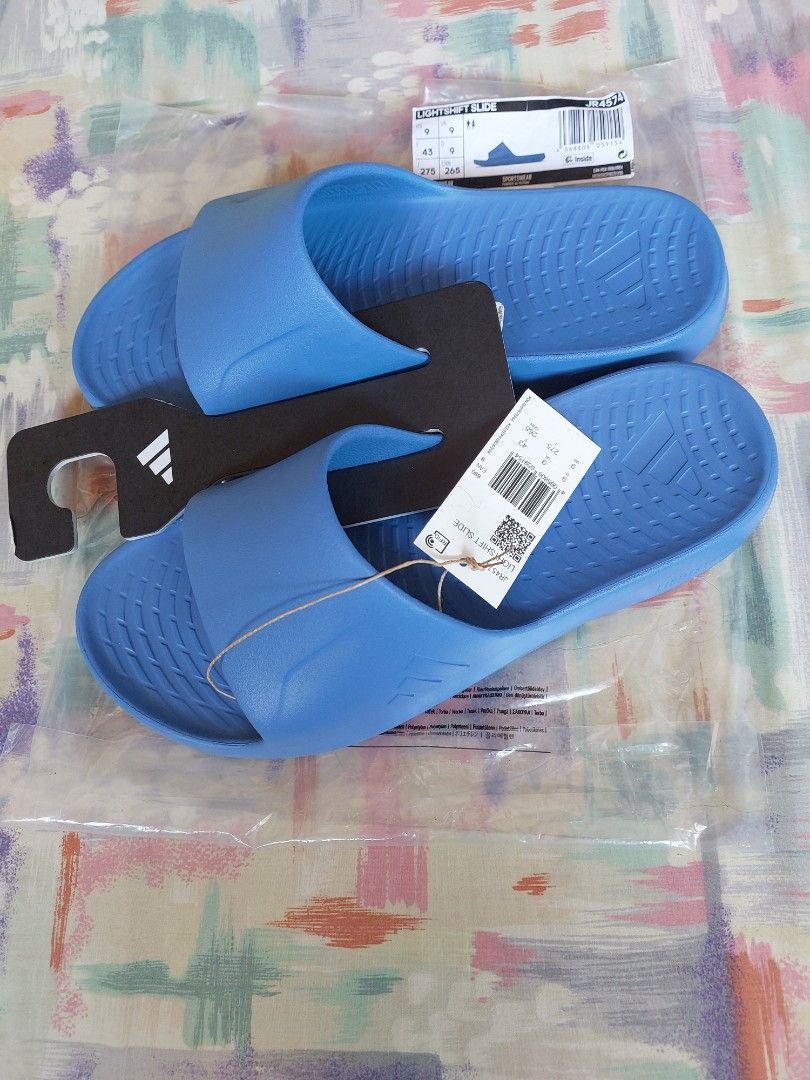 Adidas lightshift slide blue Size UK 9 (Category: Slippers & Slides) located in Cebu City. Submitted by choithrift0326 (Listing ID 1464166279, Image 3). Description: - blue Adidas Slides (Model JR4574) - Size: 43 EU / 9 UK / 9 US / 265mm - Original Price: PHP 1,500.00 - Made in Vietnam - Ideal for casual wear or post-sports relaxation.