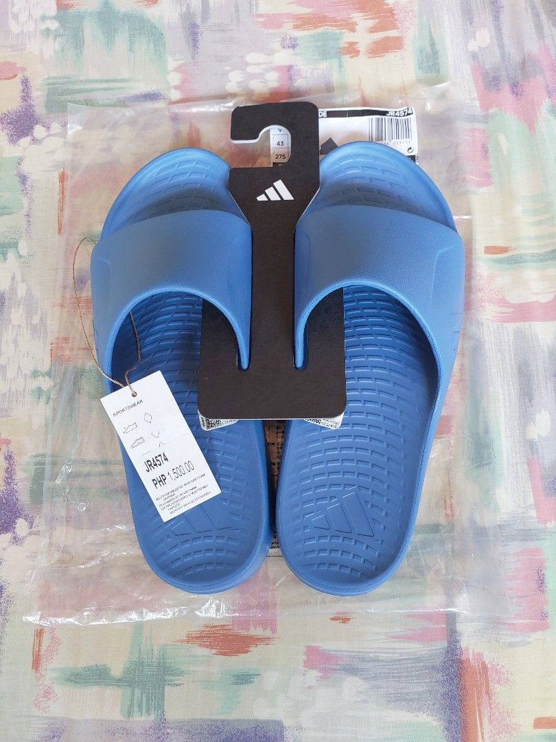 Adidas lightshift slide blue Size UK 9 (Category: Slippers & Slides) located in Cebu City. Submitted by choithrift0326 (Listing ID 1464166279, Image 1). Description: - blue Adidas Slides (Model JR4574) - Size: 43 EU / 9 UK / 9 US / 265mm - Original Price: PHP 1,500.00 - Made in Vietnam - Ideal for casual wear or post-sports relaxation.