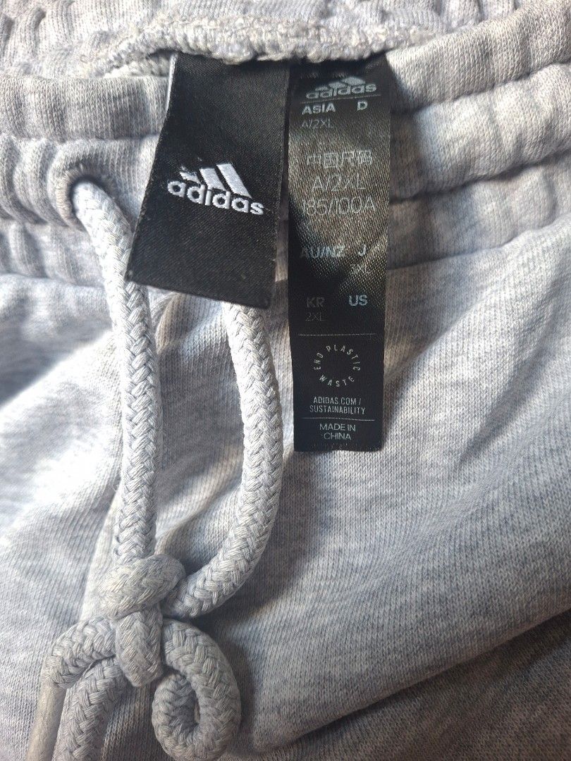 ADIDAS Men's Essentials FeelVivid Sweatpants (Category: Activewear) located in Cavite. Submitted by adynnej.various.items (Listing ID 1464217069, Image 3). Description: Have minor stain - see pictures SIZE: 2XL ON TAG W: 34-40 L: 38 COLOR RATE: 9/10.