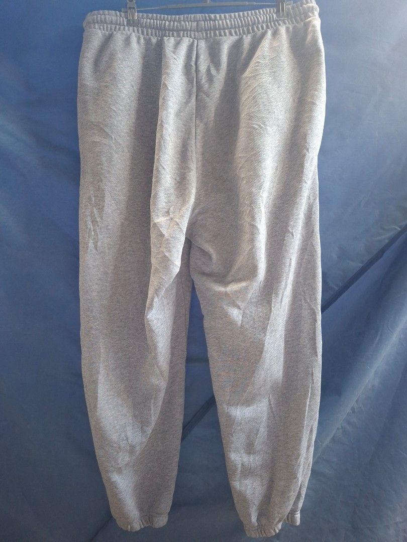 ADIDAS Men's Essentials FeelVivid Sweatpants (Category: Activewear) located in Cavite. Submitted by adynnej.various.items (Listing ID 1464217069, Image 2). Description: Have minor stain - see pictures SIZE: 2XL ON TAG W: 34-40 L: 38 COLOR RATE: 9/10.