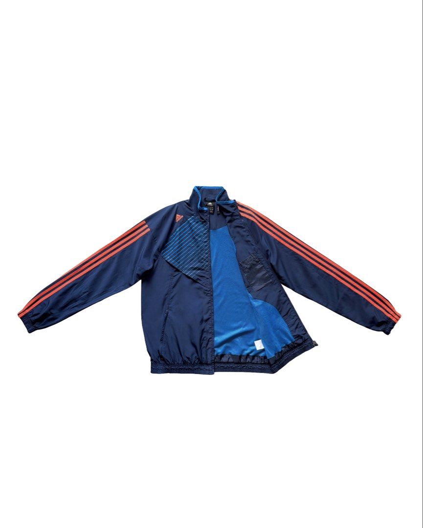 Adidas Predator Tri-Color Windbreaker (Category: Coats, Jackets and Outerwear) located in Manila. Submitted by morf_sply (Listing ID 1464218112, Image 2). Description: Water-repellent, windproof jacket. Bold 3-Stripes anchor the sleeves with ribbed cuffs, welt pockets at the hip and ribbed hem. Zip-up front. S on tag. Best fit Medium. Shoulder Width 20 in Pit to Pit 21 in Length 26.5 in Sleeves 24 in.