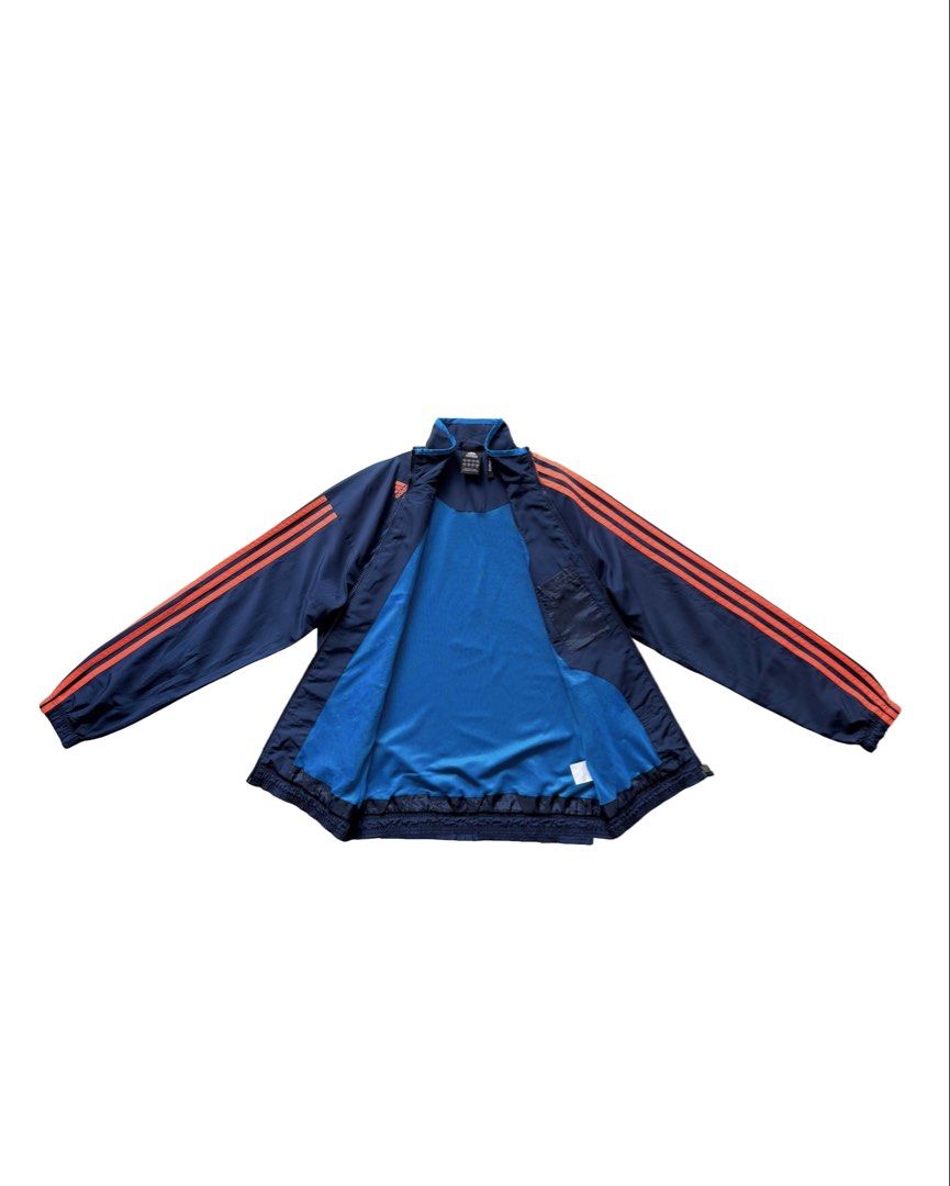 Adidas Predator Tri-Color Windbreaker (Category: Coats, Jackets and Outerwear) located in Manila. Submitted by morf_sply (Listing ID 1464218112, Image 3). Description: Water-repellent, windproof jacket. Bold 3-Stripes anchor the sleeves with ribbed cuffs, welt pockets at the hip and ribbed hem. Zip-up front. S on tag. Best fit Medium. Shoulder Width 20 in Pit to Pit 21 in Length 26.5 in Sleeves 24 in.