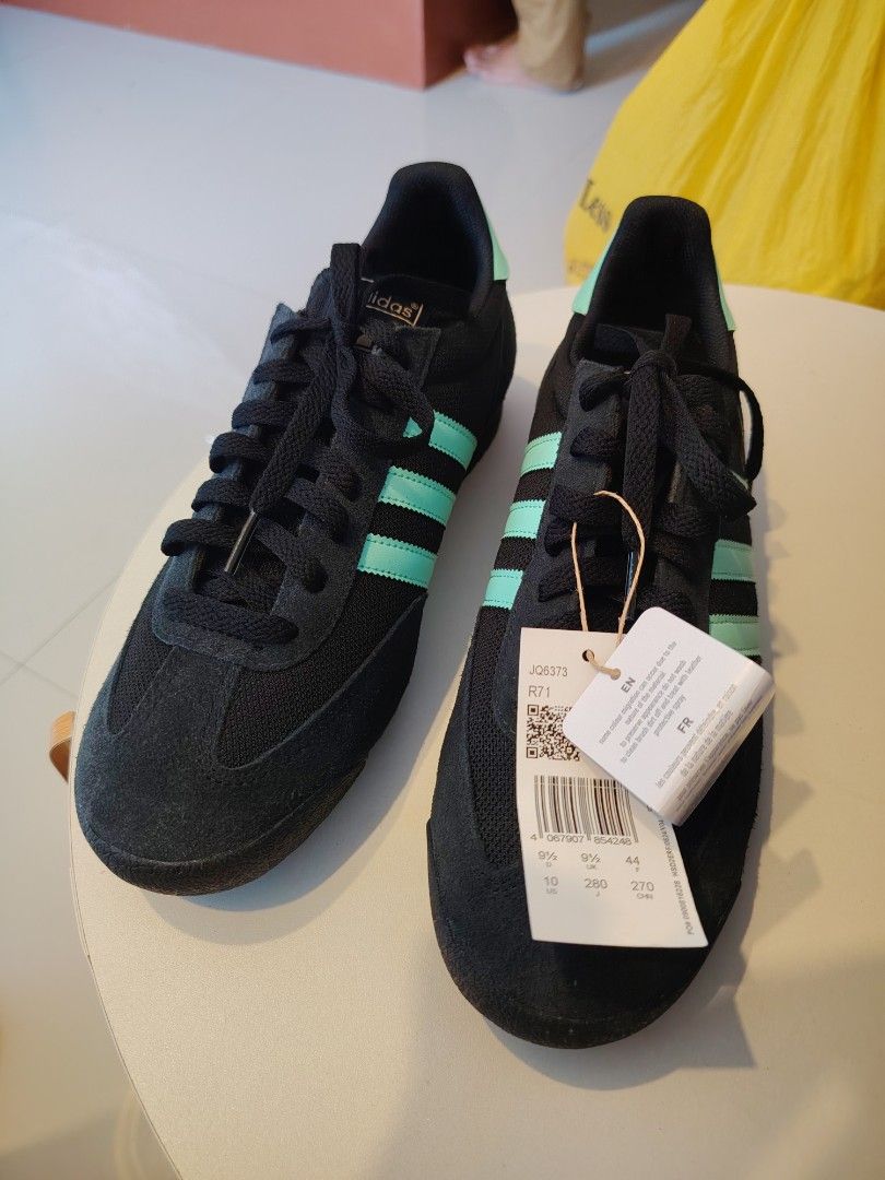 Adidas R71 Clear Mint 9.5M (Category: Sneakers) located in Agdangan. Submitted by lordie87 (Listing ID 1464187165, Image 1). Description: - Adidas sneakers - No box - Imported from Kuwait - Color: Black with mint green stripes - Size: 9.5M - Condition: Brand new with original tags - Perfect for casual and everyday wear - Reason for selling: No longer needed.