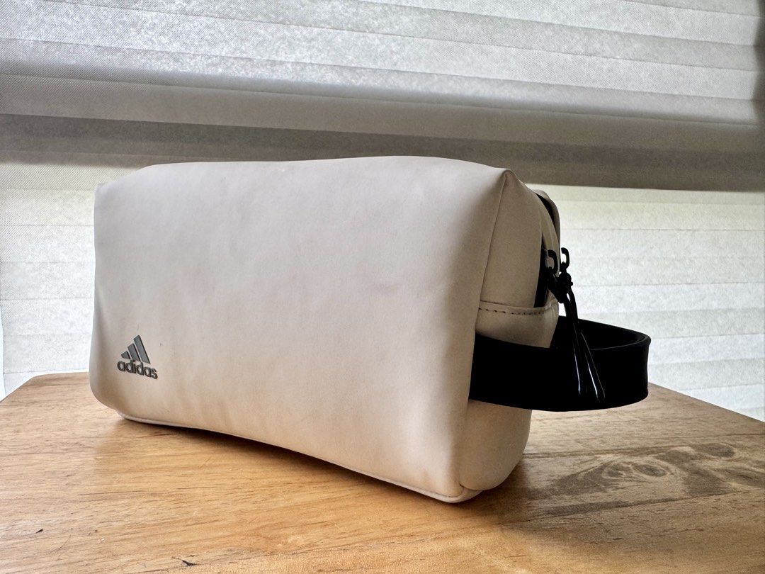 Adidas Tour Two-Zip Golf Pouch White (Category: Belt bags, Clutches and Pouches) located in Quezon City. Submitted by leone.trading (Listing ID 1464169371, Image 1). Description: Adidas Tour Two-Zip Golf Pouch Color: White, black Additional details: Plastic hardware, roomy and keeps it shape, two compartments with two-way zip openjngs, PU leather material, .