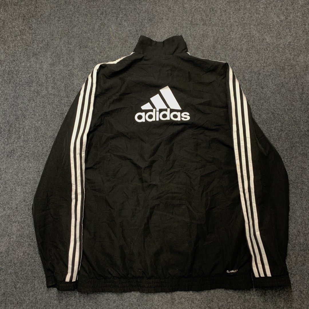 Adidas Track Jacket Black White Stripes Climalite (Category: Coats, Jackets and Outerwear) located in Imus. Submitted by la.wigginss0 (Listing ID 1464141093, Image 3). Description: - Classic black Adidas track jacket - Iconic white three stripes on sleeves and chest - Full zip closure - Two side pockets - Climalite technology for dryness and comfort - Ideal for sports or casual wear.