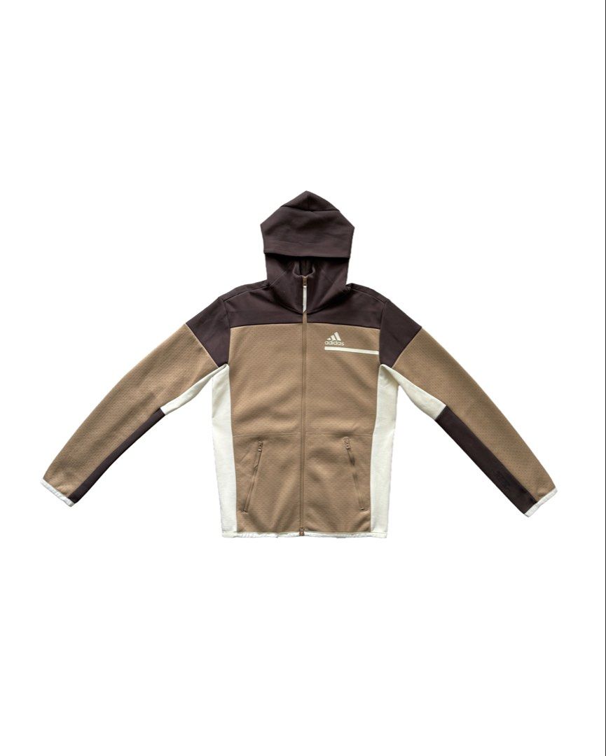 Adidas Tri-Color Hooded Track Jacket (Category: Coats, Jackets and Outerwear) located in Manila. Submitted by morf_sply (Listing ID 1464304570, Image 1). Description: Hooded jacket with long sleeves. Front zip fastening. Brand logo detail on the chest. S on tag. Best fit Medium. Shoulder Width 18 in Pit to Pit 21 in Length 27 in Sleeves 27 in.