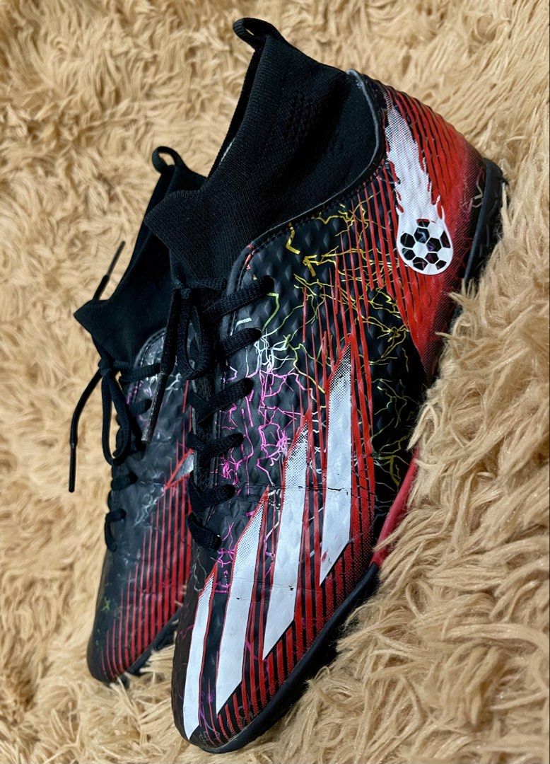 Adidas X Ghosted.3 Turf Soccer Cleats (Category: Sneakers) located in Quezon City. Submitted by donnieg-227 (Listing ID 1464275747, Image 2). Description: - Adidas X Ghosted.3 turf soccer cleats - Color: Black with red and white stripes - Design: Lightning bolt graphic - Closure: Lace-up - Features: Sock-like collar - Ideal for: Artificial grass pitches - Ready for your next game!.