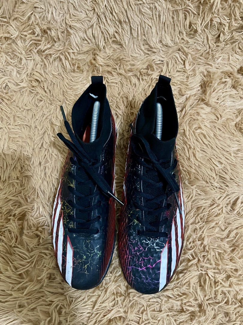 Adidas X Ghosted.3 Turf Soccer Cleats (Category: Sneakers) located in Quezon City. Submitted by donnieg-227 (Listing ID 1464275747, Image 3). Description: - Adidas X Ghosted.3 turf soccer cleats - Color: Black with red and white stripes - Design: Lightning bolt graphic - Closure: Lace-up - Features: Sock-like collar - Ideal for: Artificial grass pitches - Ready for your next game!.