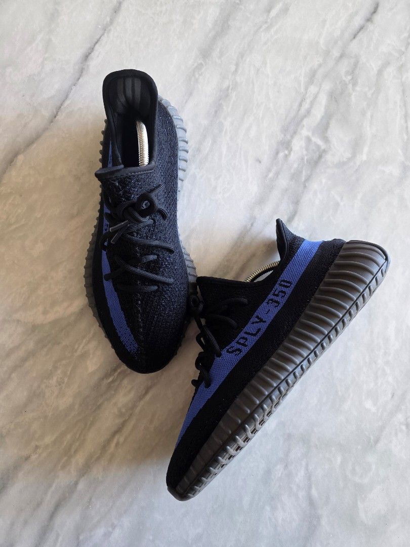 Adidas Yeezy Boost 350 V2 "Blue Stripe" (Category: Sneakers) located in Manila. Submitted by lemmeloveyou (Listing ID 1464145573, Image 1). Description: Adidas Yeezy Boost 350 V2 "Blue Stripe" - Black knit with blue stripe..
