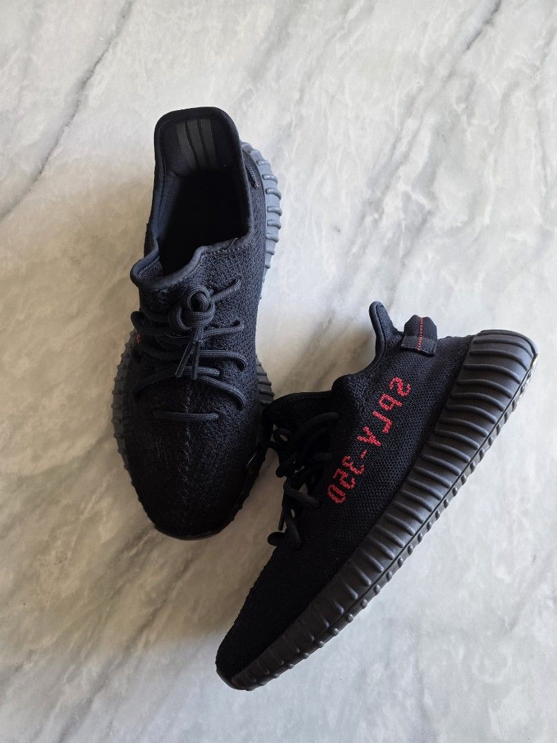 Adidas Yeezy Boost 350 V2 "Bred" (Category: Sneakers) located in Manila. Submitted by lemmeloveyou (Listing ID 1464145421, Image 1). Description: Authentic Black Adidas Yeezy Boost 350 V2 sneakers with red SPLY-350 detail. Classic ribbed sole and lace-up closure. Perfect for everyday style..