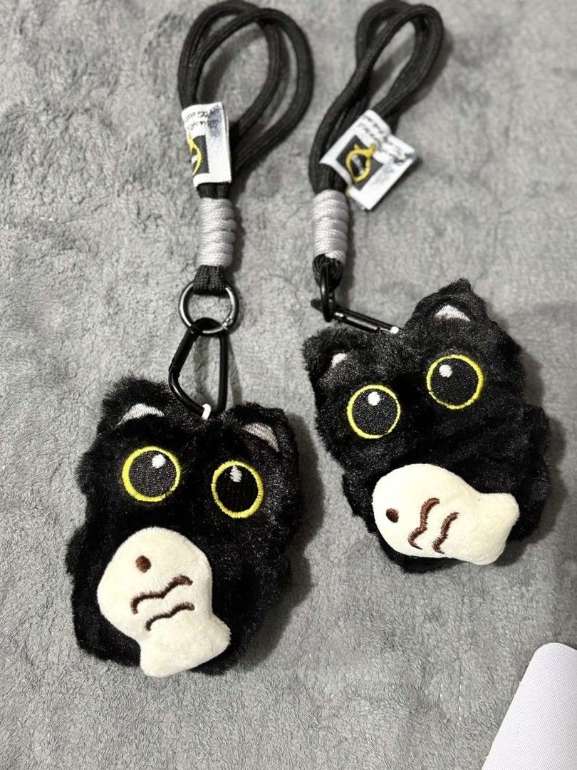 Adorable Black Cat Plushy (Category: Plushies & Soft Toys) located in Pasig City. Submitted by rnr2026 (Listing ID 1464215090, Image 3). Description: Adorable Black Cat Plushy ✨ Perfect for Keychains and Accessories ✨ This charming keychain features a black cat with yellow eyes and a white nose. It's an ideal accessory for your keys or bags. The design is simple yet eye-catching, making it a fun addition to your collection. Key Features: Black ca