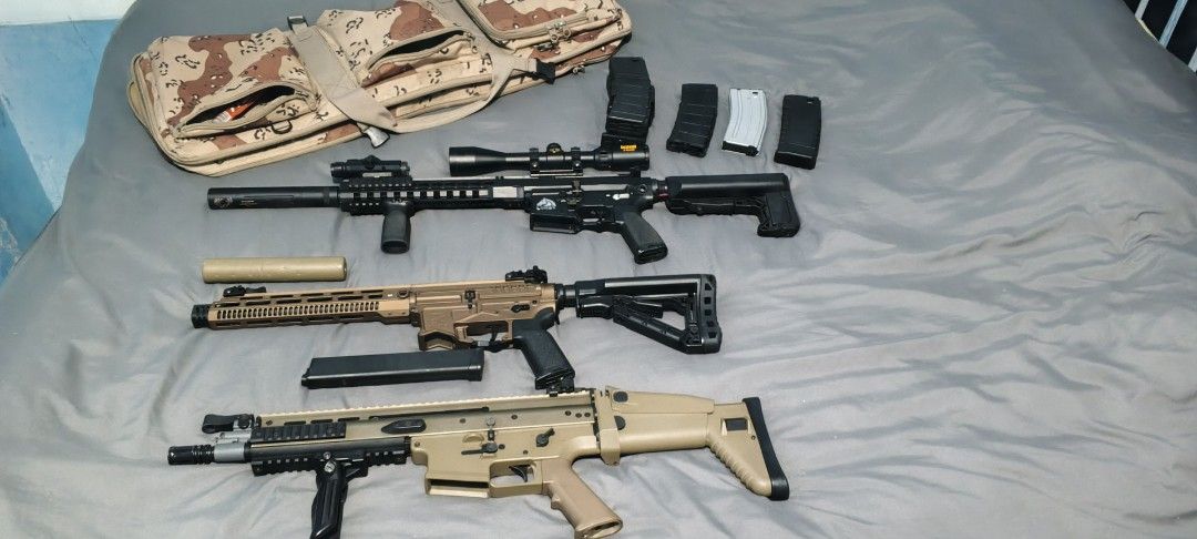 Airsoft Rifles, Vest, Mask, and Accessories Bundle (Category: Action & Battle Toys) located in Manila. Submitted by khrishpaul (Listing ID 1464190407, Image 2). Description: - Complete Airsoft Gear Bundle - Includes 3 Airsoft Rifles with Scopes and Magazines - Tactical Vest with Mask - Carry Bag - Extra Magazines - Suppressor - Ideal for airsoft enthusiasts.