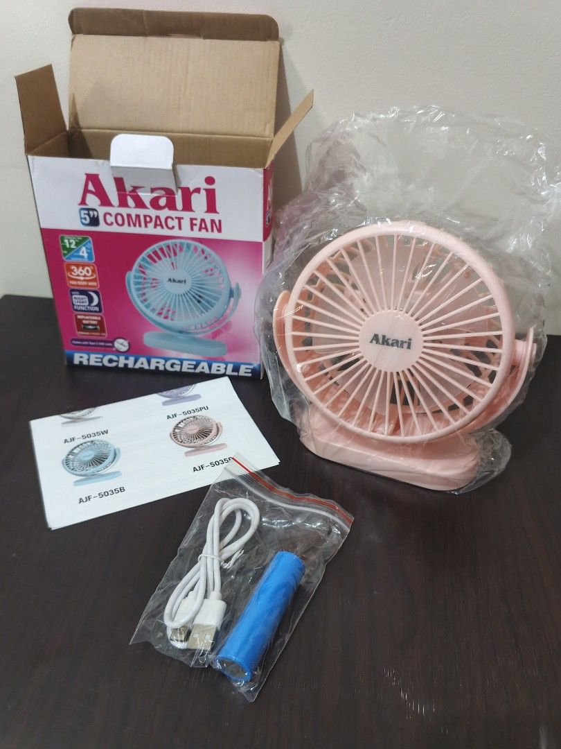 Akari 5" Rechargeable Compact Fan (Category: Fans) located in Manila. Submitted by zachariahs_choice1096 (Listing ID 1464178156, Image 3). Description: Rechargeable Compact Fan (AJF-5035) Power: 6W 3.7V 1500mAh Lithium ion battery CT: up to 4 hrs OT: up to 3 hrs (High: up to 3hrs, Medium: up to 7hrs, Low: up to 8hrs) Input voltage: DC 5V Size: 151*67*160mm With Night Light Function Replaceable battery Comes with Type-C cable With Wall / Ceiling m
