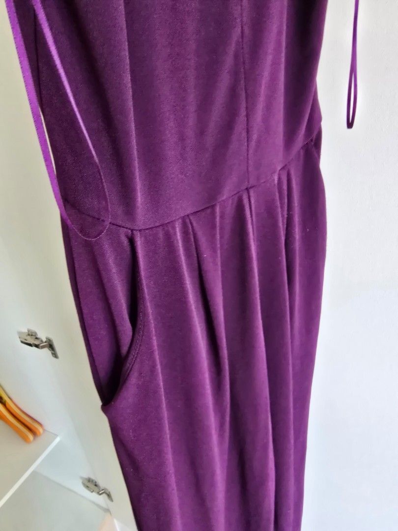 Ambiance Purple Jumpsuit (Category: Jumpsuits) located in Paranaque City. Submitted by incognitopawikan (Listing ID 1464164330, Image 2). Description: - Stunning deep purple jumpsuit - Chic halter neck design - Flattering ruching detail at the waist - Comfortable fabric with a beautiful drape - Full-length legs - Adjustable thin straps for a perfect fit - Ideal for evening events or special occasions.