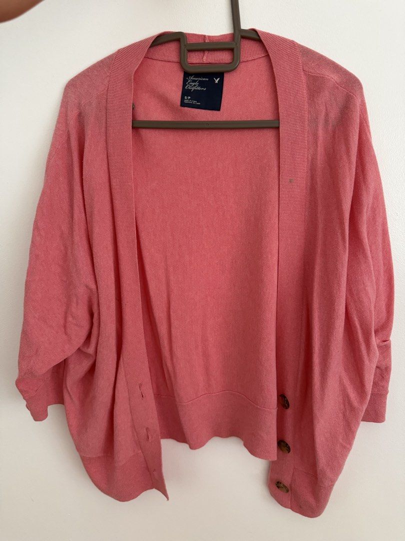 American Eagle Pink Open Front Cardigan (Category: Coats, Jackets and Outerwear) located in Paranaque City. Submitted by ferrewr (Listing ID 1464210250, Image 1). Description: - Brand: American Eagle - Color: Pink - Style: Open front with button closure - Sleeves: Three-quarter length - Material: Soft knit - Features: Great for layering, versatile for tops and dresses - 100% authentic/ original .