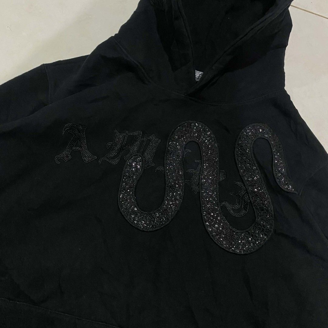 Amiri Snake Embroidered Sequin Pullover Hoodie (Category: Coats, Jackets and Outerwear) located in Dipolog. Submitted by ethrifttt (Listing ID 1464300951, Image 2). Description: Amiri Snake Embroidered Sequin Pullover Hoodie 24 x 27 excellent condition, no issue.