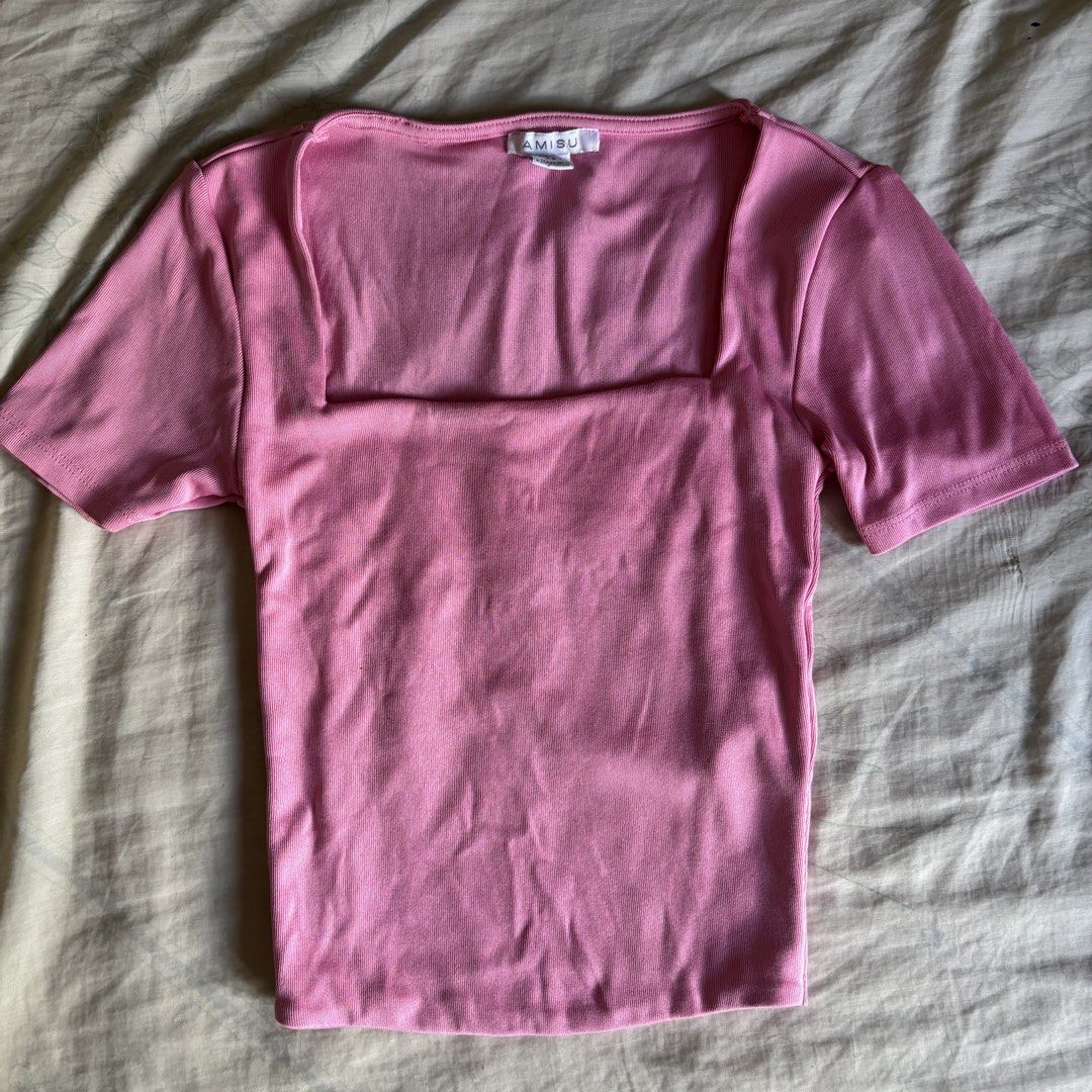 Amisu Baby Pink Squareneck Double Lining Top (Category: Others Tops) located in Binan City. Submitted by myprelovedhaul (Listing ID 1464151543, Image 3). Description: This is an Amisu square-neck semi-cropped top in a solid bubblegum pink color. It features a distinctive wide square neckline, short sleeves, and is crafted from a stretchable, body-hugging fabric that typically includes a supportive double lining..