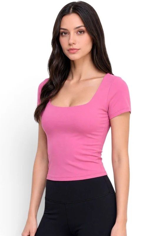 Amisu Baby Pink Squareneck Double Lining Top (Category: Others Tops) located in Binan City. Submitted by myprelovedhaul (Listing ID 1464151543, Image 1). Description: This is an Amisu square-neck semi-cropped top in a solid bubblegum pink color. It features a distinctive wide square neckline, short sleeves, and is crafted from a stretchable, body-hugging fabric that typically includes a supportive double lining..