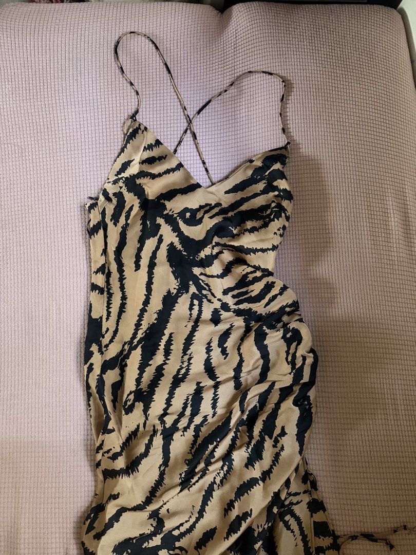 animal print dress (Category: Dresses) located in Daraga. Submitted by littlemissdeclutter.wtme (Listing ID 1464215954, Image 1). Description: - used twice only - animal print - with slit - bodycon like dress but flowy at the bottom - pm me for ww - can fit up to M - criss cross at the back.