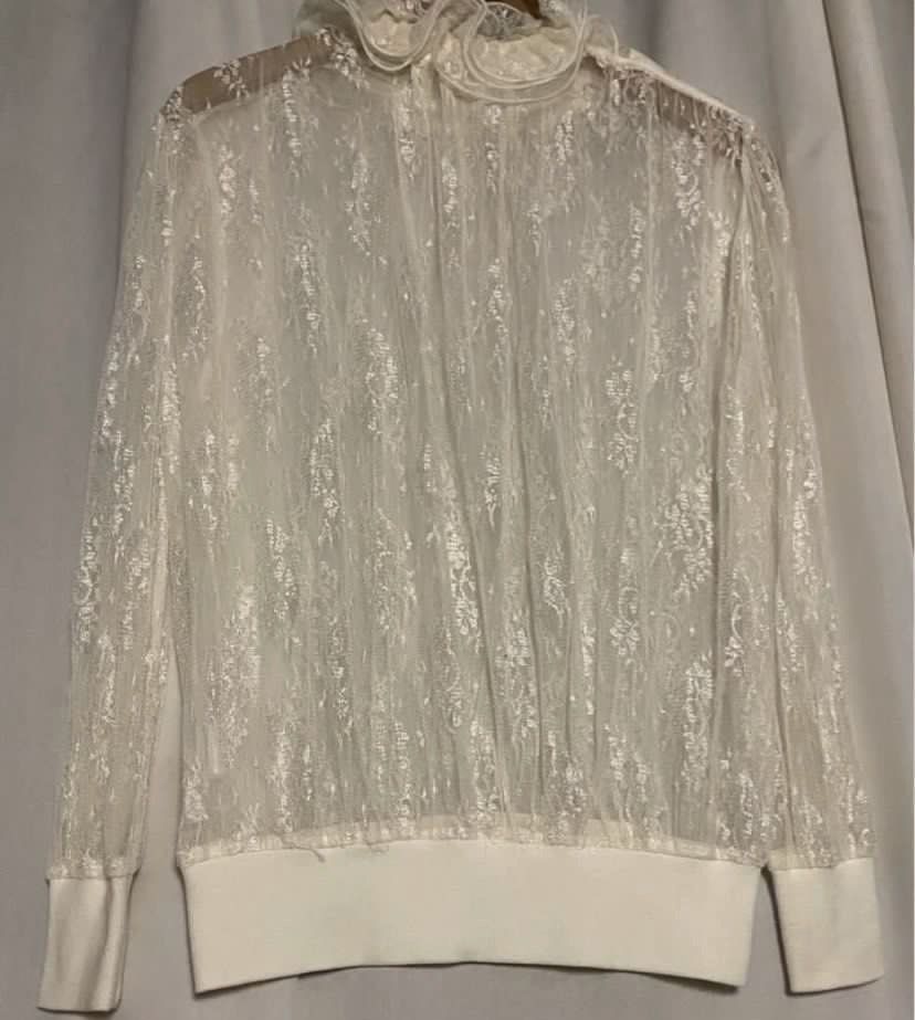 Anna Rose White High Ruffled Neck Sheer Lace Longsleeve (Category: Shirts) located in Caloocan City. Submitted by declutteringph. (Listing ID 1464303575, Image 3). Description: No Size on the tag! Measurements: Dimensions: (inches) Shoulder Width: 17” Bust Width: 27” Body Length: 24” Sleeves Length: 24”.