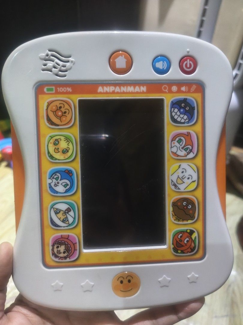 Anpanman Learning Tablet Toy (Category: Educational & Learning Toys) located in Caloocan City. Submitted by carmelasfashiongallery (Listing ID 1464340449, Image 1). Description: - Interactive Anpanman learning tablet for kids - Features character buttons and a screen for engaging play - Helps with learning and development - Fun orange and white design - Minor scratches on screen, but fully functional - Perfect gift for young Anpanman enthusiasts 