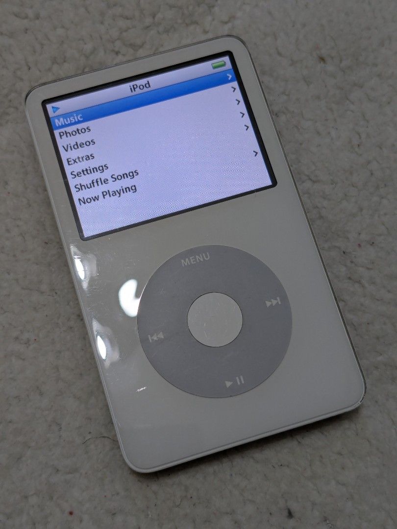 Apple iPod Video 5.5th Gen White (80GB (Category: Portable Music Players) located in Binmaley. Submitted by northpixel (Listing ID 1464169398, Image 2). Description: Apple iPod Video 5.5th Gen White (80GB) Good condition Good battery life Good hdd health (check picture) Can sync well on itunes With songs included (can add your playlist from streaming platform) Unit and cable only ✅6500 fixed ✅COD/Gcash payment ✅PM.
