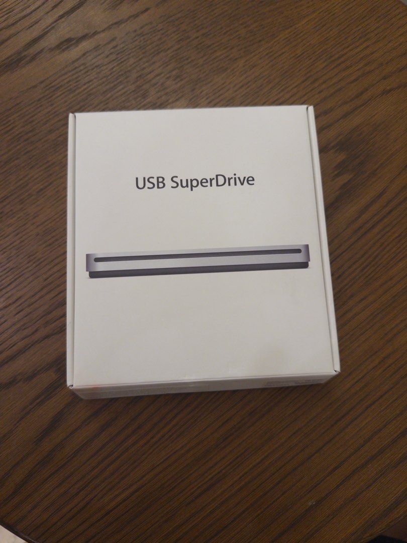 Apple USB SuperDrive External CD/DVD Drive (Category: Hard Disks & Thumbdrives) located in Pasig City. Submitted by pillow23 (Listing ID 1464196876, Image 2). Description: - Connects easily via USB type A - for burning CDs and DVDs - comes in the original box - it works - bought it from another seller in Carousell, I only needed it to download something from an old CD.