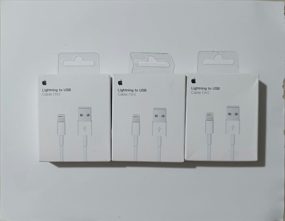 APPLE USB-LIGHTNING CABLE (Category: Chargers & Cables) located in Marilao. Submitted by zettevibar (Listing ID 1464297048, Image 1). Description: - Genuine Apple USB-Lightning Cable - 1-meter length - White color - Compatible with iPhone, iPad, and iPod - Original Apple product for reliable charging and syncing.