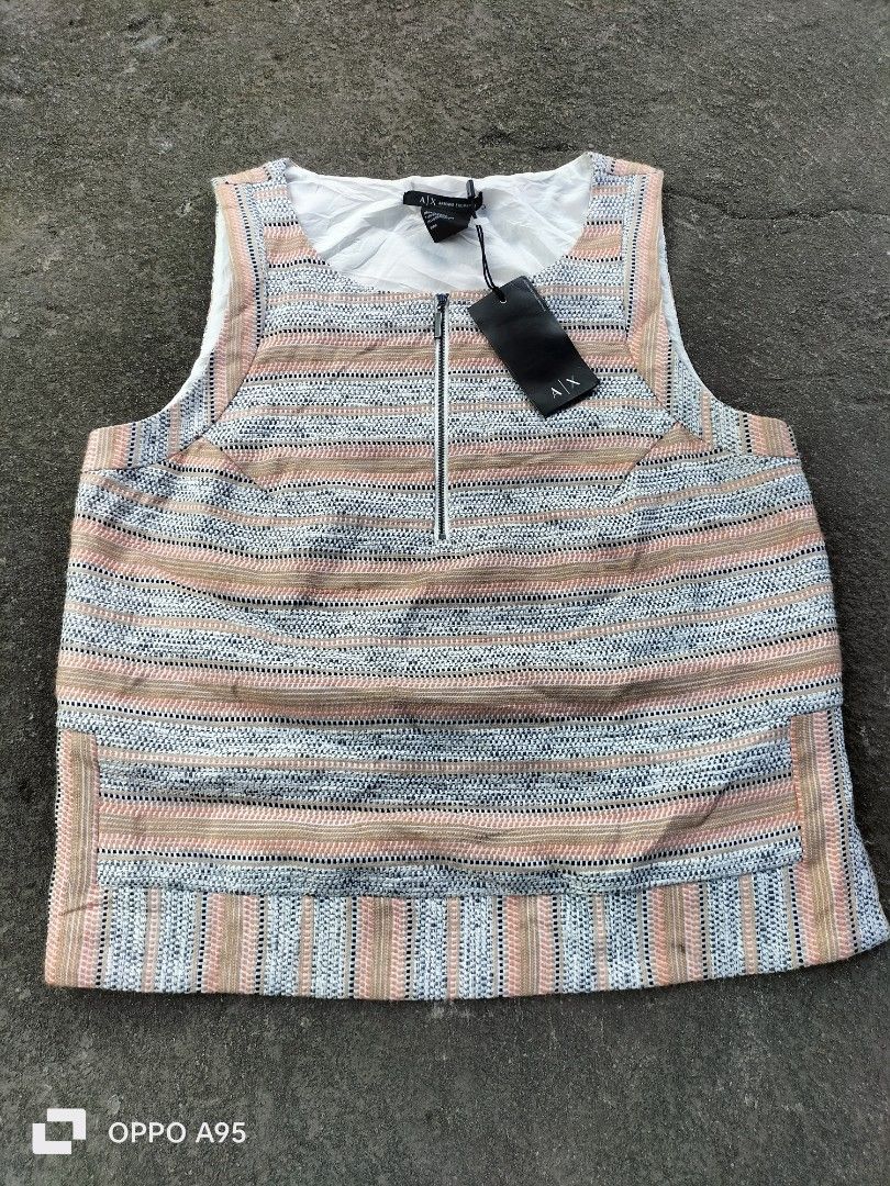 Armani Exchange Sleeveless Zip Front Textured Top S (Category: Sleeveless) located in Manila. Submitted by john_erwin_dollaga_cafe (Listing ID 1464293588, Image 1). Description: - Armani Exchange sleeveless top - Textured fabric with horizontal stripes (peach, white, blue) - Zip front detail - Size: S - Made in China - Original tags attached.
