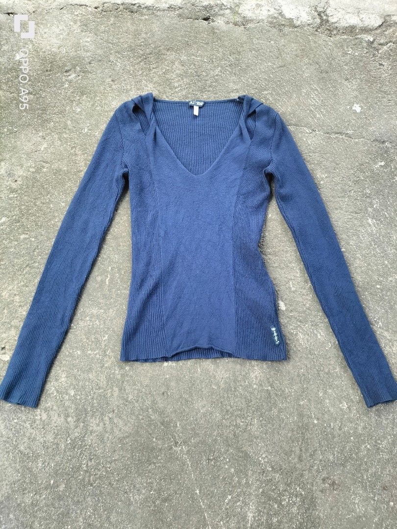 Armani Jeans Navy Blue Ribbed V-Neck Sweater (Category: Longsleeves) located in Manila. Submitted by john_erwin_dollaga_cafe (Listing ID 1464254021, Image 1). Description: - Brand: Armani Jeans - Color: Navy Blue - Style: Long-sleeved V-neck sweater - Material: Ribbed knit fabric - Features: Armani Jeans logo on sleeve - Size: 42 Italy / 8 USA - Versatile: Great for layering or wearing solo.