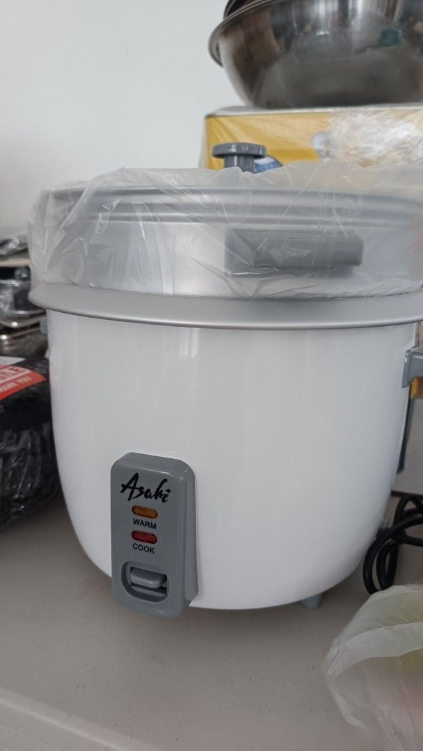 Asahi RC-15 Rice Cooker with Steamer (Category: Cookers) located in Quezon City. Submitted by tinastankyle (Listing ID 1464232385, Image 1). Description: - Asahi Rice Cooker, Model RC-15 - Color: White body with grey controls - Features: Cook and Warm settings - Includes: Steamer attachment and original box - Ideal for: Cooking rice and steaming food RFS: Wrong size for us, needed bigger one.