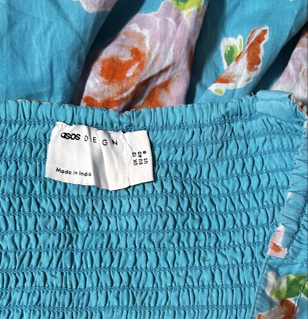 ASOS (Category: Dresses) located in Davao. Submitted by sart0ria85 (Listing ID 1464231094, Image 3). Description: This London famous basedbrand is one of the best dressdown fashion. In a garterized, sleeveless bustier style daydress. In light blue green and orange florals. 100% COTTON MADE IN INDIA 🇮🇳 LARGE. Size 8 EXCELLENT CONDITION (94/100).