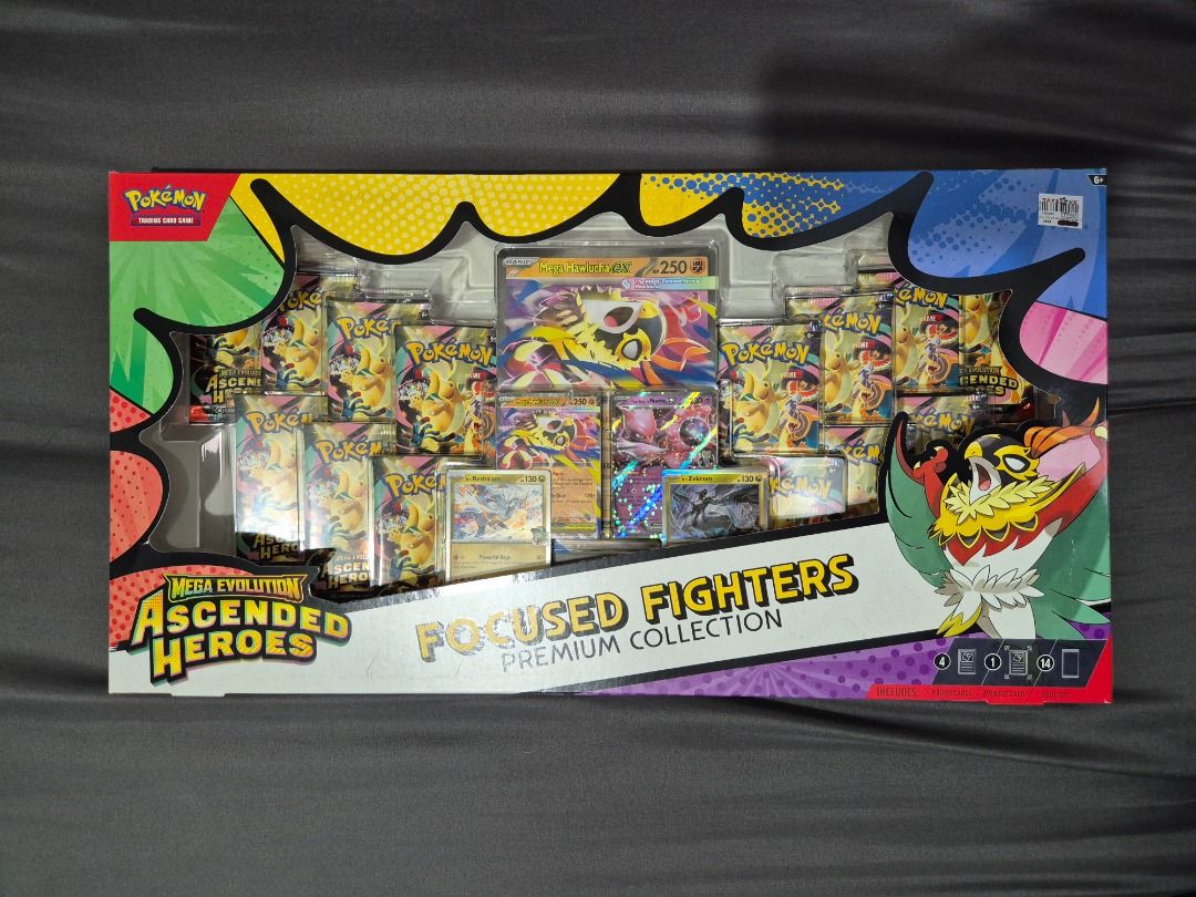 Ascended Heroes Focused Fighters Premium Collection (Category: Interactive Toys) located in Mandaluyong City. Submitted by randombro (Listing ID 1464225604, Image 1). Description: * Also accepting trades (% in my favor) to MODERN ENGLISH CARDS (Full-arts / IRs / SIRs) * The Pokémon TCG: Ascended Heroes Focused Fighters Premium Collection includes: • 2 foil promo cards featuring Mega Hawlucha ex and Team Rocket's Mewtwo ex: • 2 foil promo cards fe
