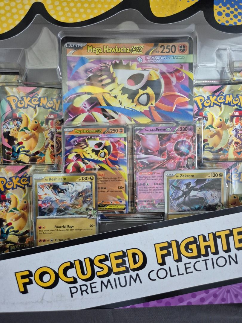 Ascended Heroes Focused Fighters Premium Collection (Category: Interactive Toys) located in Mandaluyong City. Submitted by randombro (Listing ID 1464225604, Image 3). Description: * Also accepting trades (% in my favor) to MODERN ENGLISH CARDS (Full-arts / IRs / SIRs) * The Pokémon TCG: Ascended Heroes Focused Fighters Premium Collection includes: • 2 foil promo cards featuring Mega Hawlucha ex and Team Rocket's Mewtwo ex: • 2 foil promo cards fe