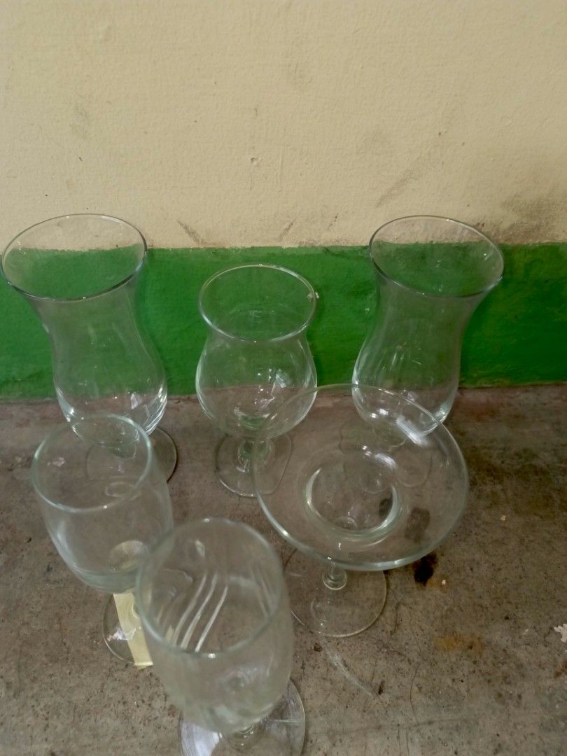 Assorted Clear Glass Wine and Cocktail Glasses (Category: Dinnerware & Cutlery) located in Quezon City. Submitted by eyesellgoodthings (Listing ID 1464249605, Image 2). Description: Assorted clear glass drinking glasses bundle. Includes champagne flutes & wine glasses, some with decorative patterns. Perfect for parties or daily use. Pick up only..