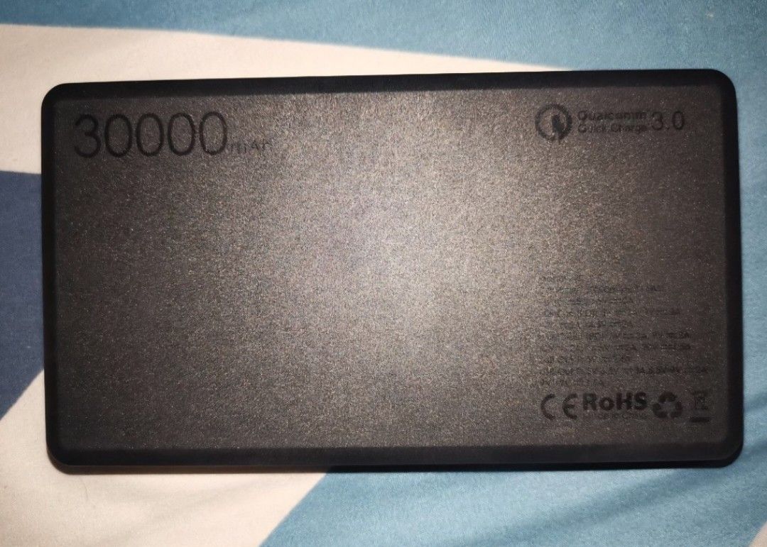 AUKEY 30,000 mAh Power Bank (Category: Batteries & Power Banks) located in Manila. Submitted by dcory (Listing ID 1464200714, Image 2). Description: - With box, no cable included inside the box - It holds enough power to charge your phone many times (4.3x based on my recent testing, I own a Samsung S25 Ultra phone) - Minimal scratches and a tiny cracked (please see 4th image) but it doesn't affect its performance - Current SRP is P2,999 (save P1k