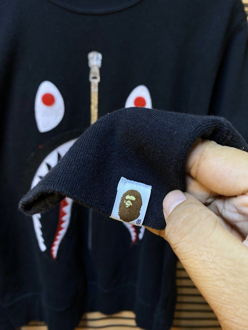 AUTHENTIC BAPE “PATCH SHARK” CREWNECK SWEATSHIRT (Category: Coats, Jackets and Outerwear) located in Makati City. Submitted by drip.poww (Listing ID 1464249137, Image 3). Description: - Authentic BAPE (AS NEW) - Color: BLACK - Size: Large - Dimes: 22x28 - Authentic - Excellent condition - Need wash, fresh from bale - Material: 100% Cotton Please don’t expect too much—these are thrifted (ukay) items. 😊 !!STILL NEGOTIABLE!!.
