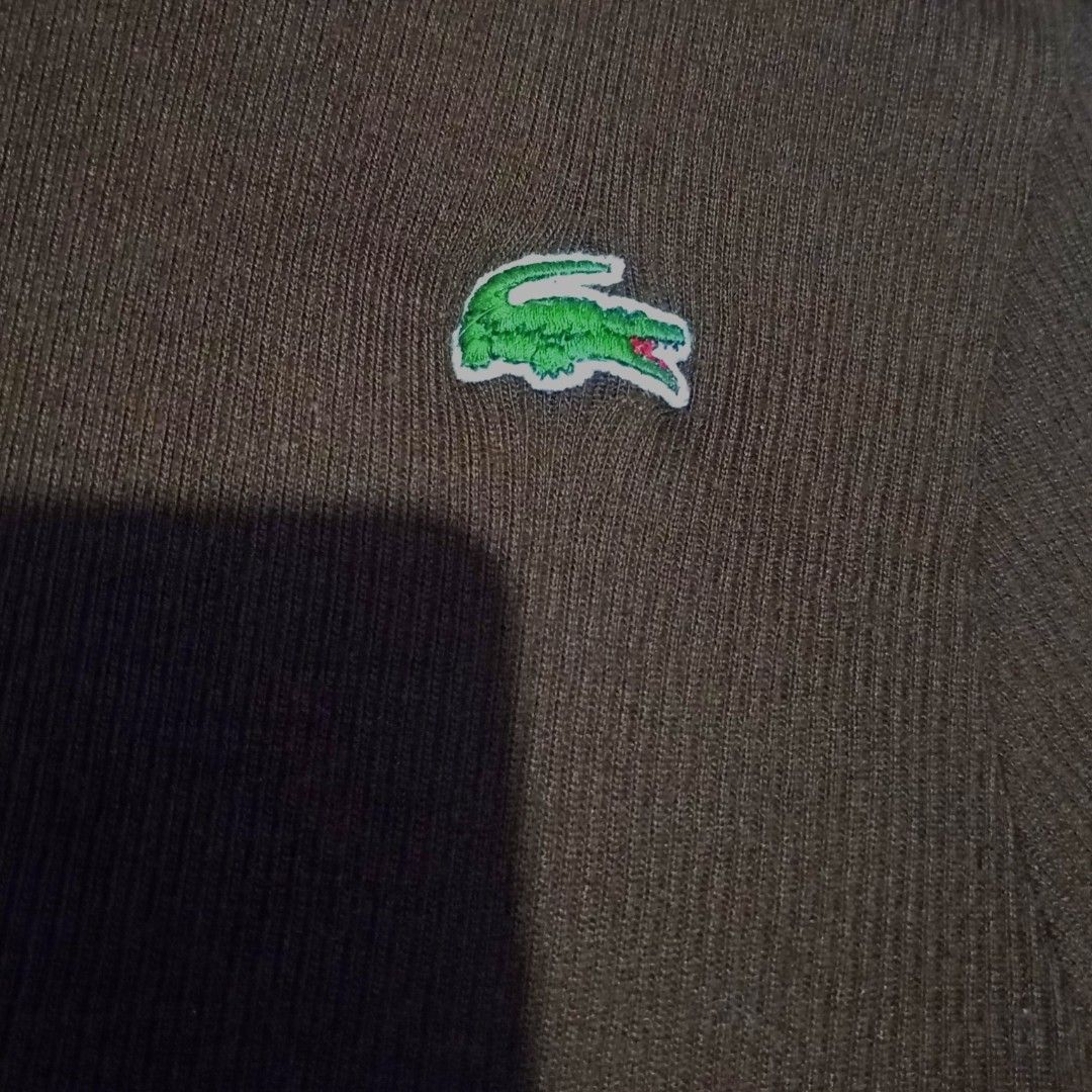 Authentic Brown Lacoste Long Sleeve Turtleneck (Category: Others Tops) located in Rizal. Submitted by cosmicwonders (Listing ID 1464275549, Image 2). Description: ₱250 + SF Please manage your expectations as this is thrifted/preloved. Color may vary due to lighting. L: 23.5" | W: 13" ★ Payment first ★MOP: GCASH ★ COURRIER: J&T DM for more Qs!.