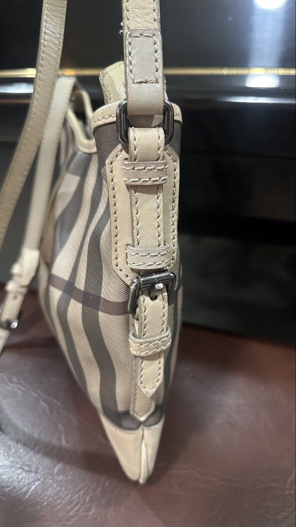 Authentic Burberry Plaid Sling Bag (Category: Luxury Bags & Wallets) located in Las Pinas. Submitted by marshmallowmax (Listing ID 1464218258, Image 3). Description: Guaranteed Authentic! Excellent used except for a minimal stain near zipper-refer photo With dustbag.