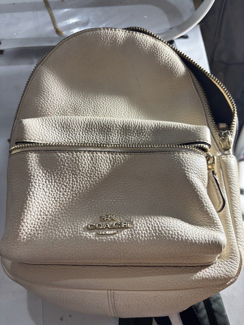 AUTHENTIC COACH SMALL CHARLIE BACKPACK (Category: Luxury Bags & Wallets) located in Davao. Submitted by driane21 (Listing ID 1464227010, Image 2). Description: -11 Inches in length -Has permanent minor scratches in the leather -Still good for use 🤍 -E1757 F0826 (Made in 2017).