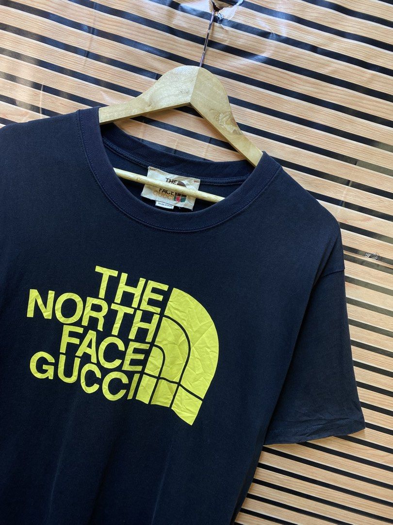 AUTHENTIC GUCCI X THE NORTH FACE “Graphic Tee” (Category: Tshirts & Polo Shirts ) located in Makati City. Submitted by drip.poww (Listing ID 1464236901, Image 2). Description: - Authentic Gucci x The North Face - Color: Black - Size: Large - Dimes: 23x29 - Authentic - Excellent condition - Need wash, fresh from bale - Material: 100% Cotton Please don’t expect too much—these are thrifted (ukay) items. 😊 !!STILL NEGOTIABLE!!.