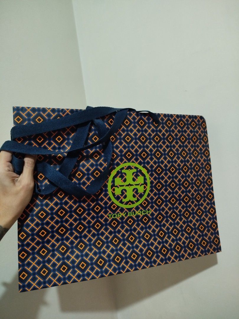 AUTHENTIC LUXURY PAPER BAGS 🔥 (Category: Everything Else Others) located in Naga. Submitted by jea1991 (Listing ID 1464280924, Image 2). Description: 4pcs gucci large paper bag: 250 each prada: 150 tory burch: 150 coach: 50 pesos 2pcs lacoste: 200.