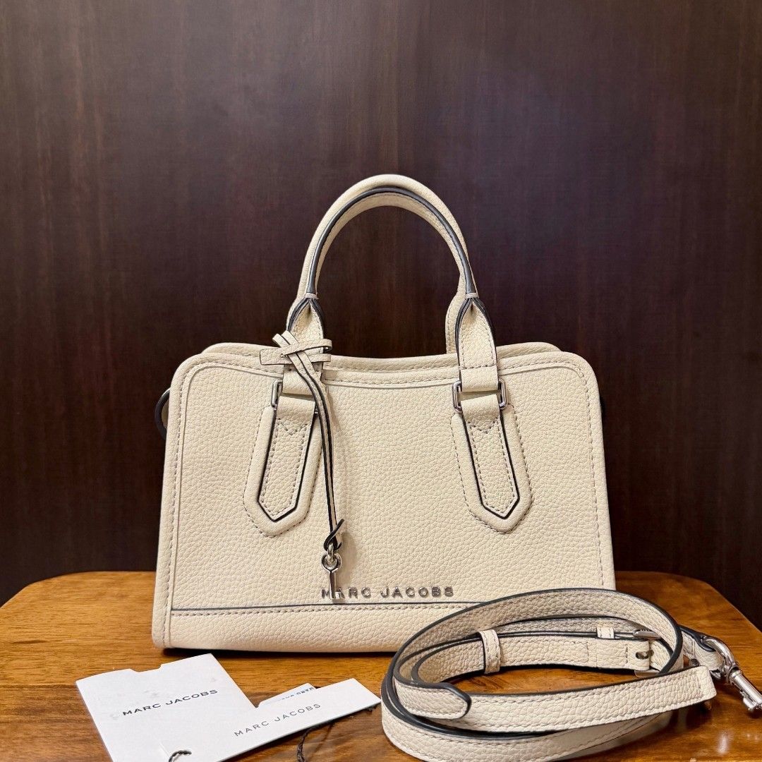 [Authentic] Marc Jacobs Drifter Satchel Crossbody Bag (Category: Cross-body Bags) located in Caloocan City. Submitted by margarette8 (Listing ID 1464326990, Image 1). Description: ‼️ FOR SALE ‼️ [Authentic] Marc Jacobs Drifter Satchel Crossbody Bag SALE price: 6,500PHP (SLIGHTLY negotiable) • Bought in Thailand • Original Price: 16,000PHP • Size: SMALL | Color: WHITE (Silver hardware) • Type: Top Handle Bag • Crafted in Pebbled Leather • NO dents