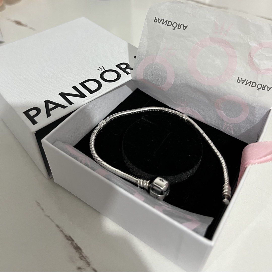 Authentic Pandora Bracelet (Category: Bracelets) located in Mandaluyong City. Submitted by cksy33359 (Listing ID 1464345487, Image 1). Description: 19cm too big for me .