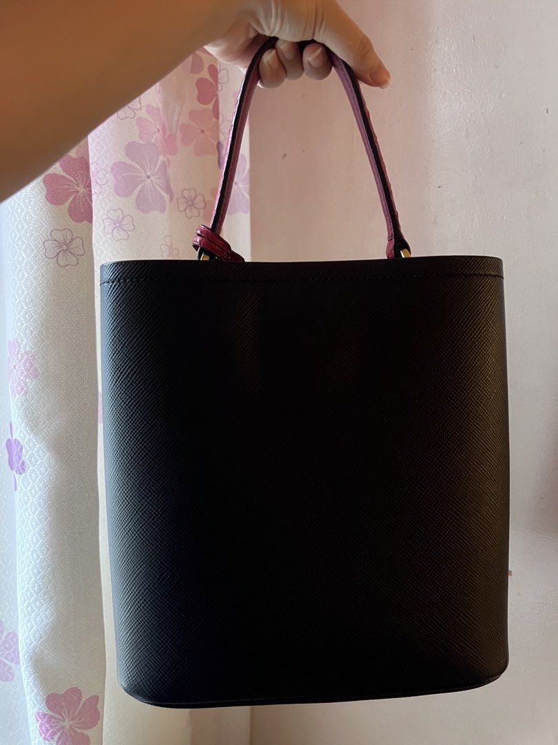 Authentic Prada Panier Exotic Bag (Category: Luxury Bags & Wallets) located in Manila. Submitted by ot7purple (Listing ID 1464205532, Image 3). Description: - Authentic Prada Panier Exotic Bag - Black Saffiano leather exterior, Gold hardware with Red Genuine Crocodile handle, tag, sides and strap. - Can be worn two way (Top handle and Crossbody). - White tag is well intact. - Has signs of usage: scratches on the interior and minimal fadings on th